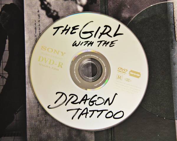 The official design for the discart on the Girl With the Dragon Tattoo DVD